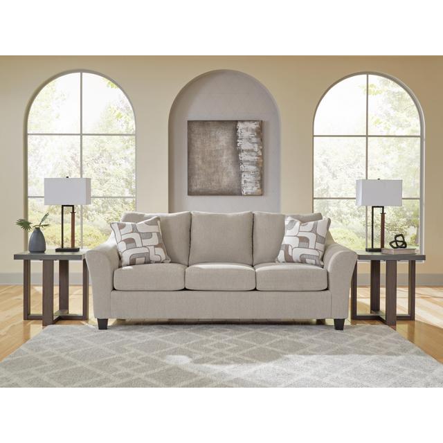 Light Gray Three-Cushion Sofa with Accent Pillows